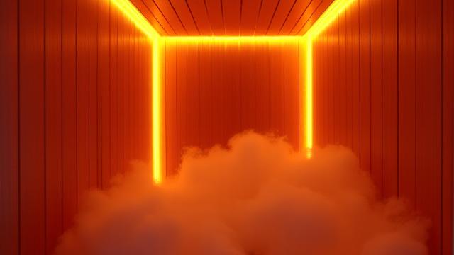 Interno di una moderna sauna a infrarossi, con luci soffuse e un'atmosfera rilassante, che evoca benessere e recupero.